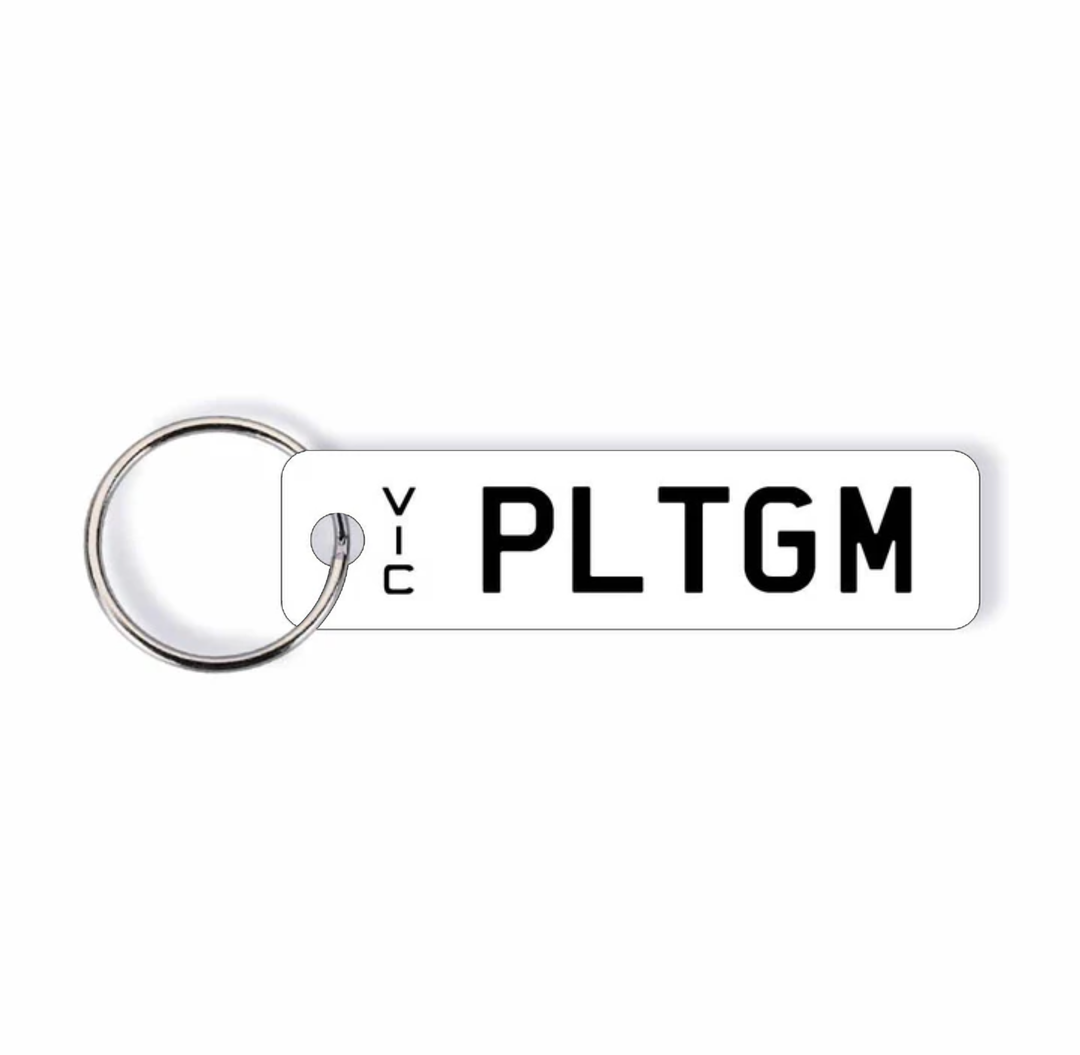 Victoria black text with white plate slim keychain